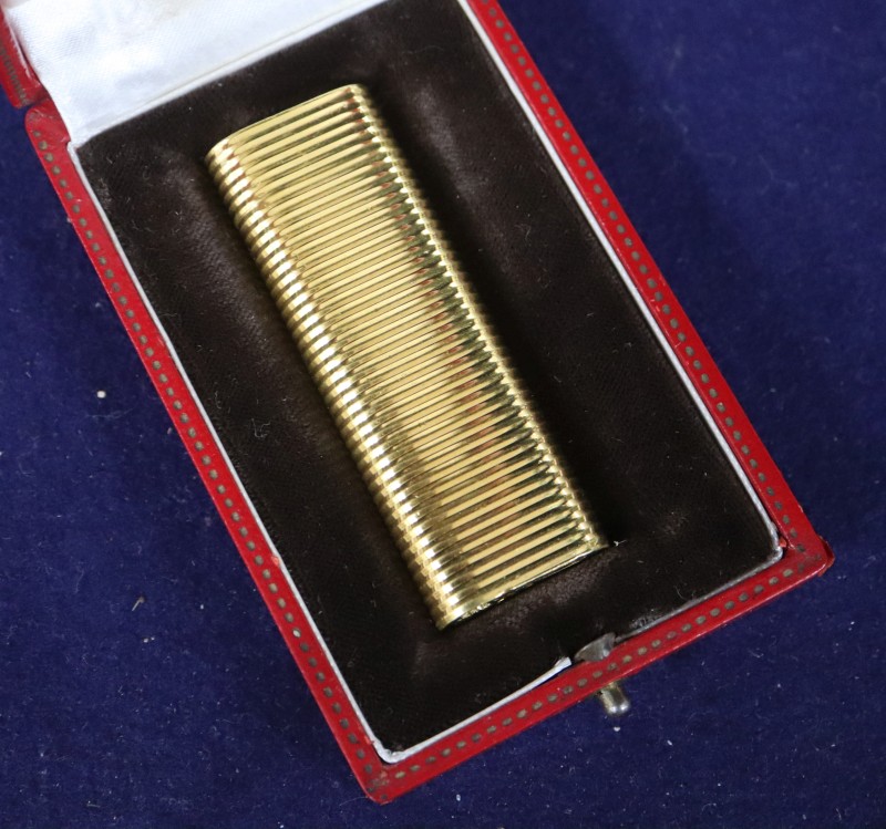 A Cartier gold-plated lighter, cased